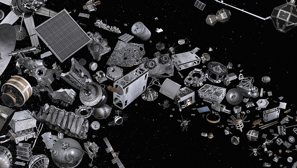 El cambio climático encoge la atmósfera y satura el espacio